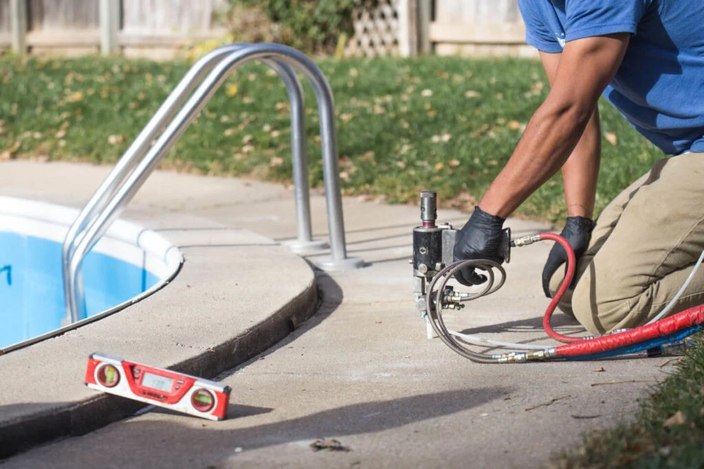 Lifting concrete on a pool deck with PolyLevel
