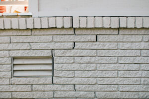 Uneven white painted bricks