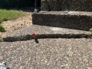 uneven concrete stairs before