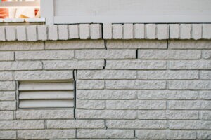 Uneven white painted bricks