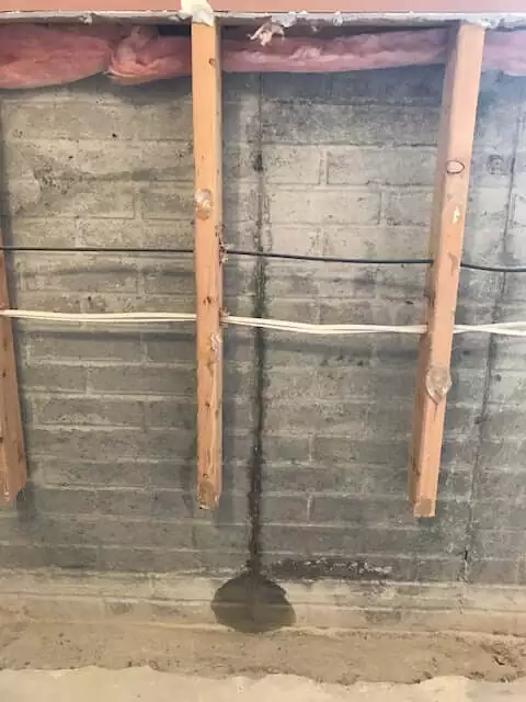 Water coming through foundation wall in basement