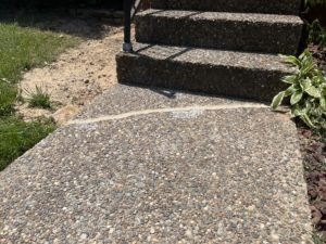 uneven concrete stairs after