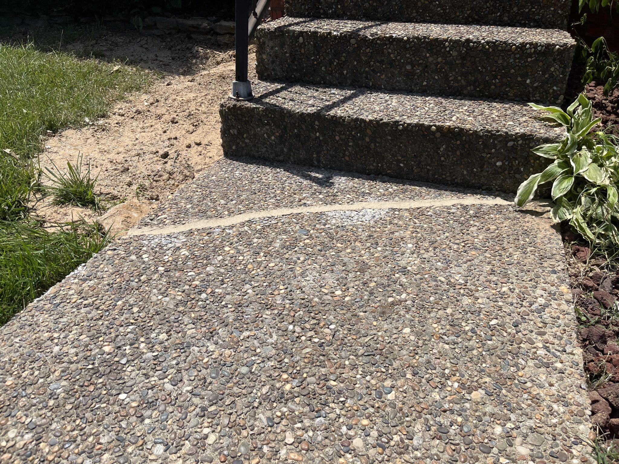 After photo of the repair of a sidewalk crack